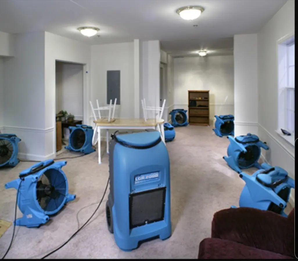Air movers and dehumidifier setup for Water Damage Restoration in Cherryville
